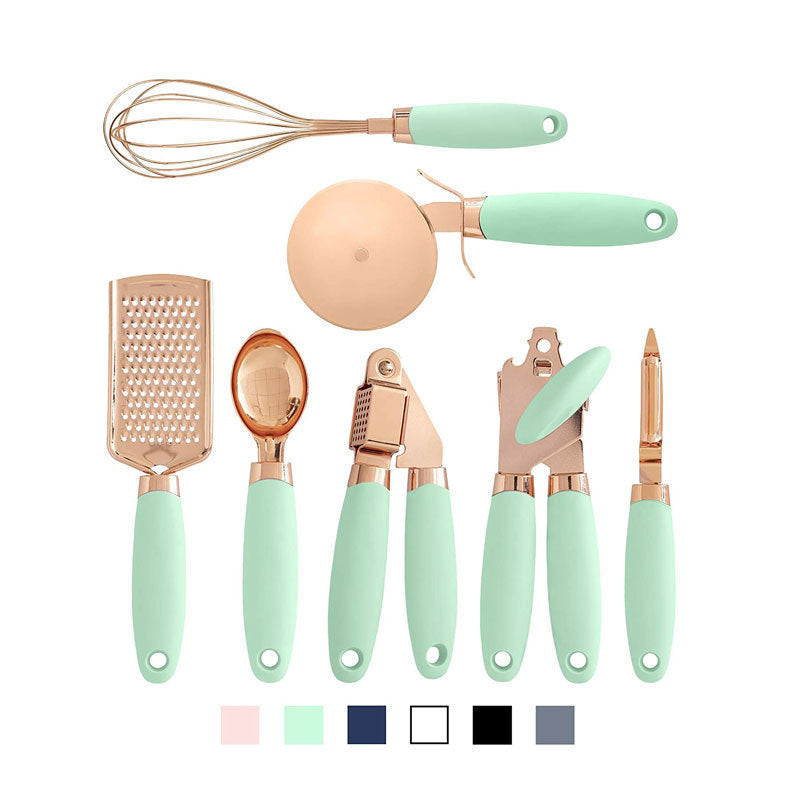 Stainless steel kitchen gadgets 7-piece set with assorted cooking utensils displayed together