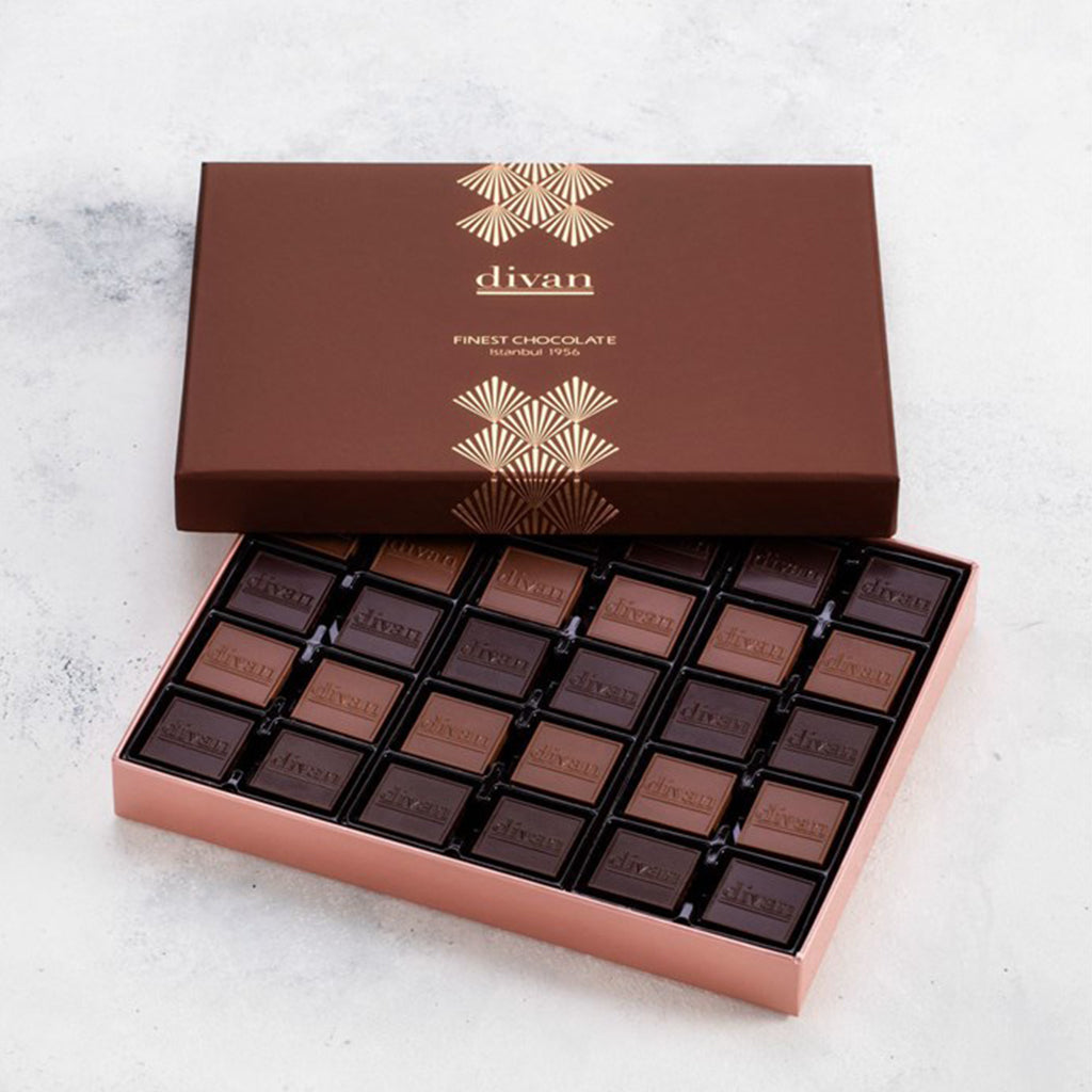 S101 Divan Madlen Chocolate bar in 750g package with rich, glossy chocolate exterior and detailed packaging.