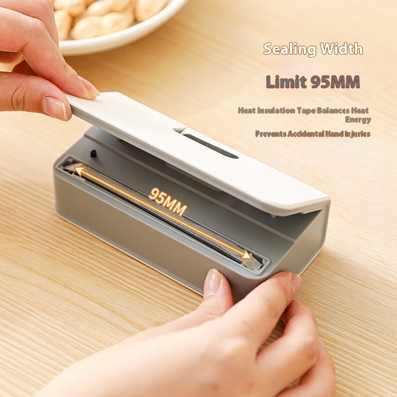 BACKUPMYFILESNOW® Snack Bag Sealer showing a hand sealing a plastic snack bag with the compact, easy-to-use device.