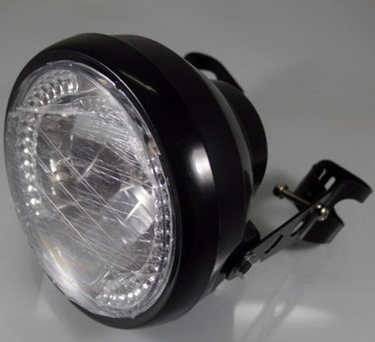 Motorcycle headlight with turn signal indicator blinker and mounting bracket for cafe racer