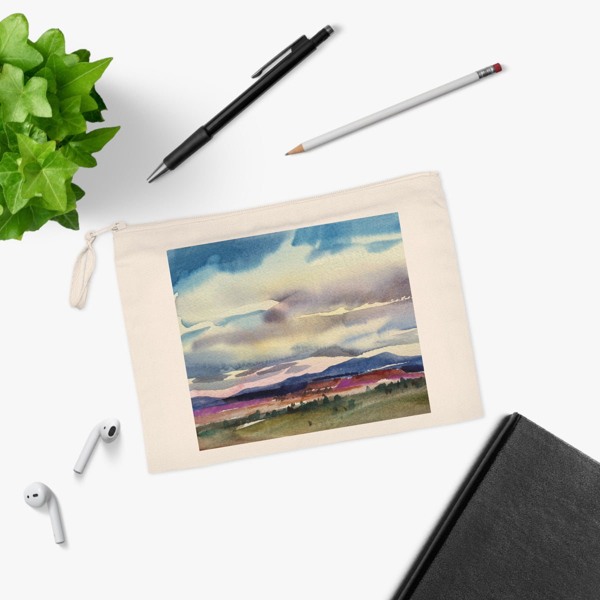 Eco-friendly pouch with original artwork "Tranquil Mountain View 1" by Barbara Cleary, featuring a scenic mountain landscape design.