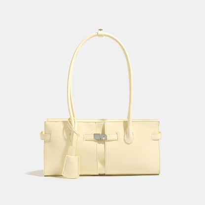 Women's versatile commuter handbag with luxurious feel and large capacity, structured design with shoulder straps
