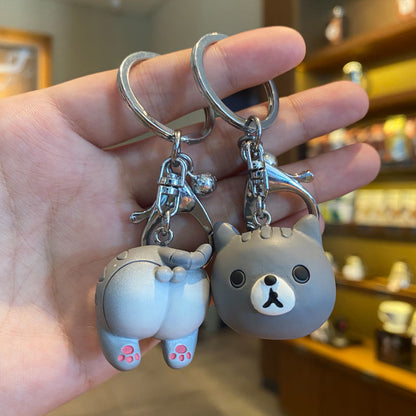 Cute creative key ring doll ornament hanging from a keychain
