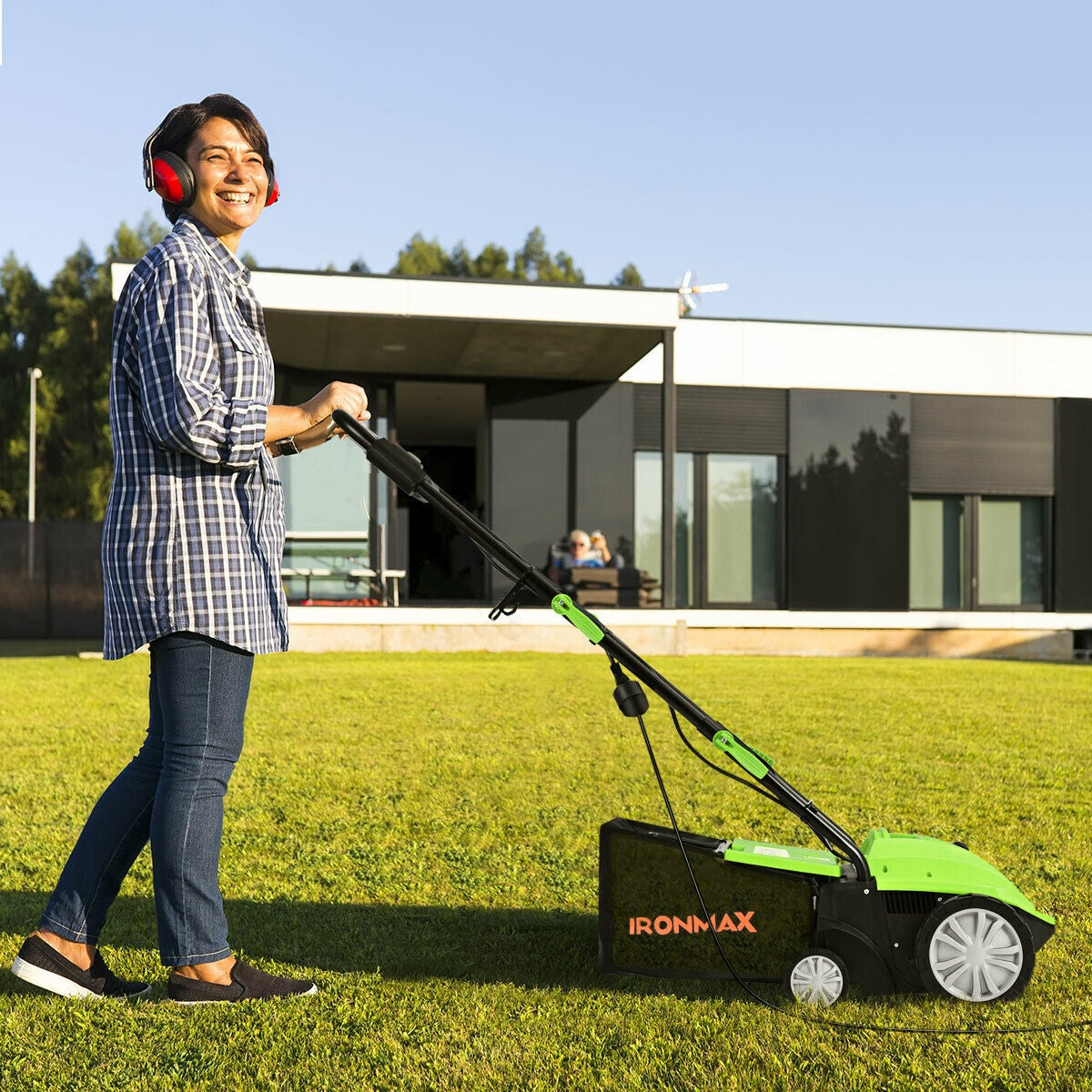 Kids' 24V electric ride-on tractor by GBruno Store with detachable trailer and remote control, suitable for outdoor play.