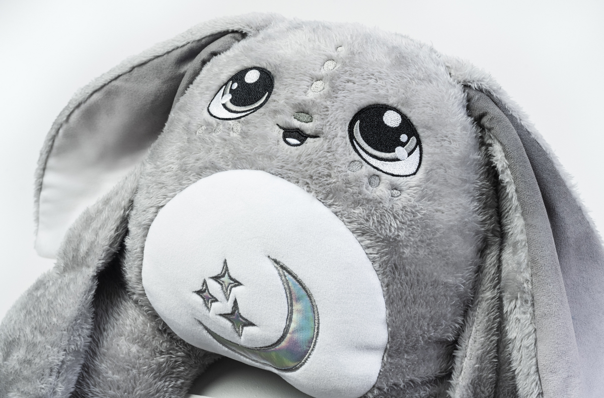 Moon Pals Gamma 5lb Hugger Plush toy featuring soft, cuddly plush fabric and a cute, friendly character design.