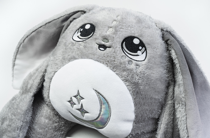 Moon Pals Gamma 5lb Hugger Plush toy featuring soft, cuddly plush fabric and a cute, friendly character design.