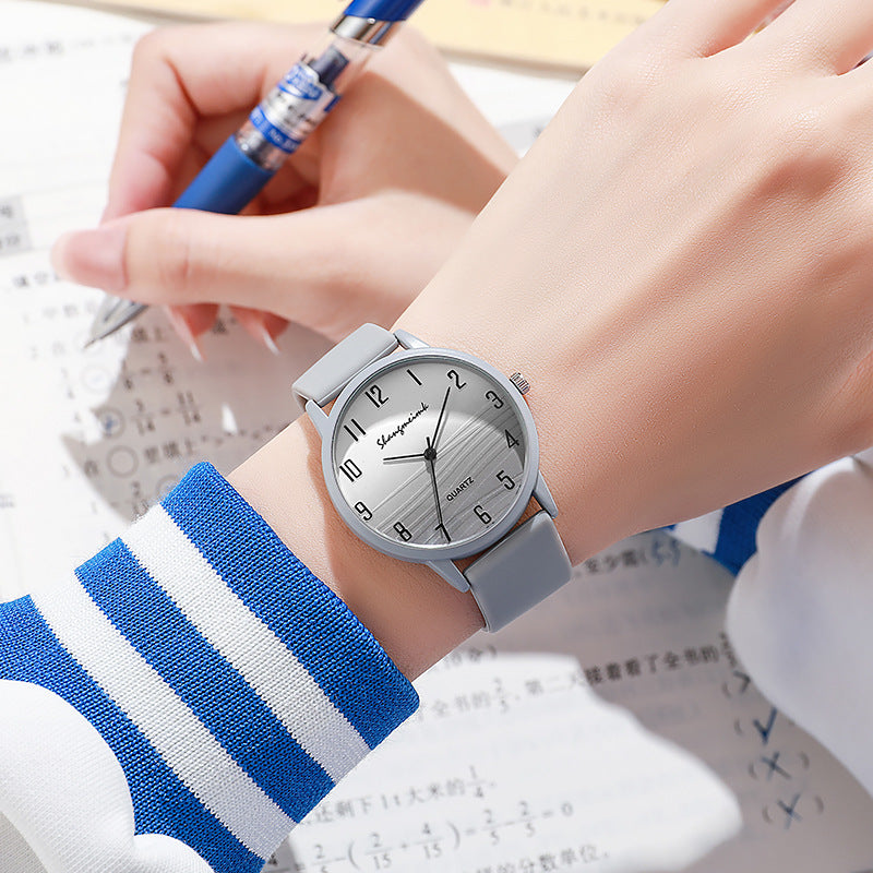 Casual simple jelly color women's watch with a translucent band and minimalist dial