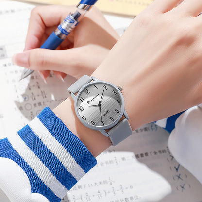 Casual simple jelly color women's watch with a translucent band and minimalist dial