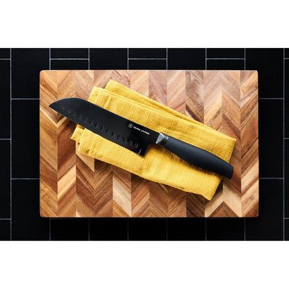 Dura Living Titan 7-inch black Santoku knife with stainless steel blade and ergonomic handle for precise slicing and chopping.