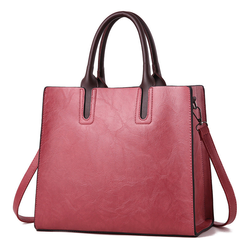 Vintage women's tote bag from BACKUPMYFILESNOW® with sturdy handles and classic design, suitable for daily use.