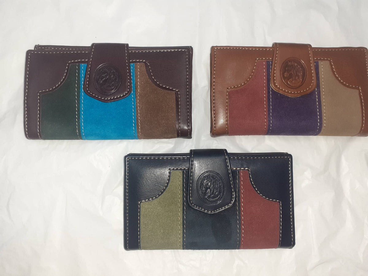 Handmade women's wallet featuring multiple card slots and a sleek leather design, perfect for everyday use.