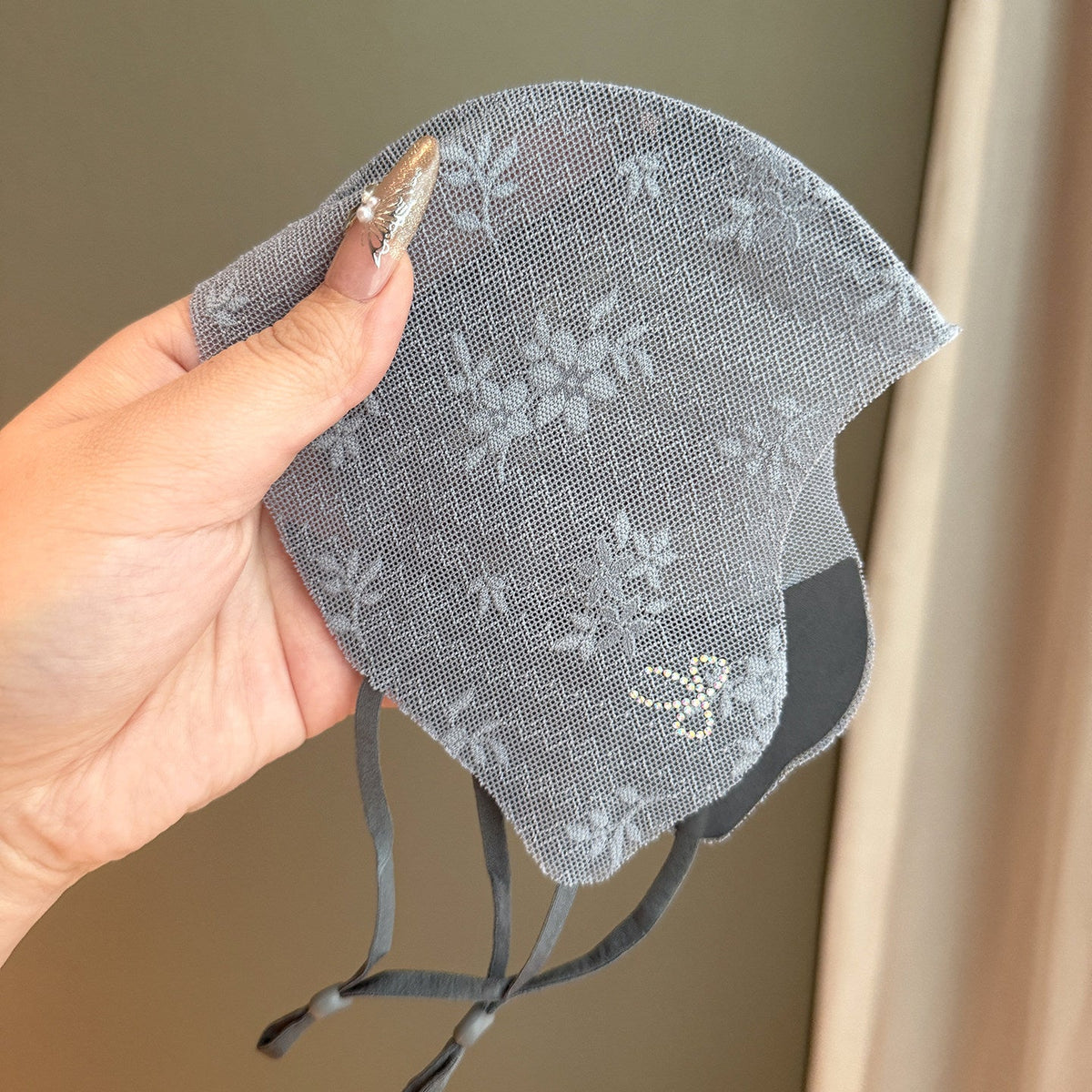 Sun-protective washable sunshade face mask in a lightweight design, shown from the front