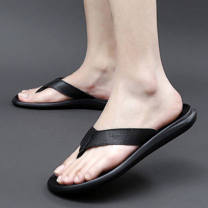 Men’s flat-soled outdoor flip-flop sandals in a casual style, viewed from the side
