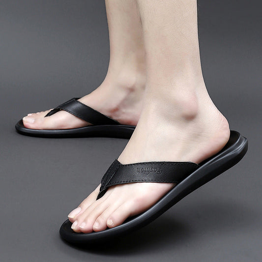 Men’s flat-soled outdoor flip-flop sandals in a casual style, viewed from the side