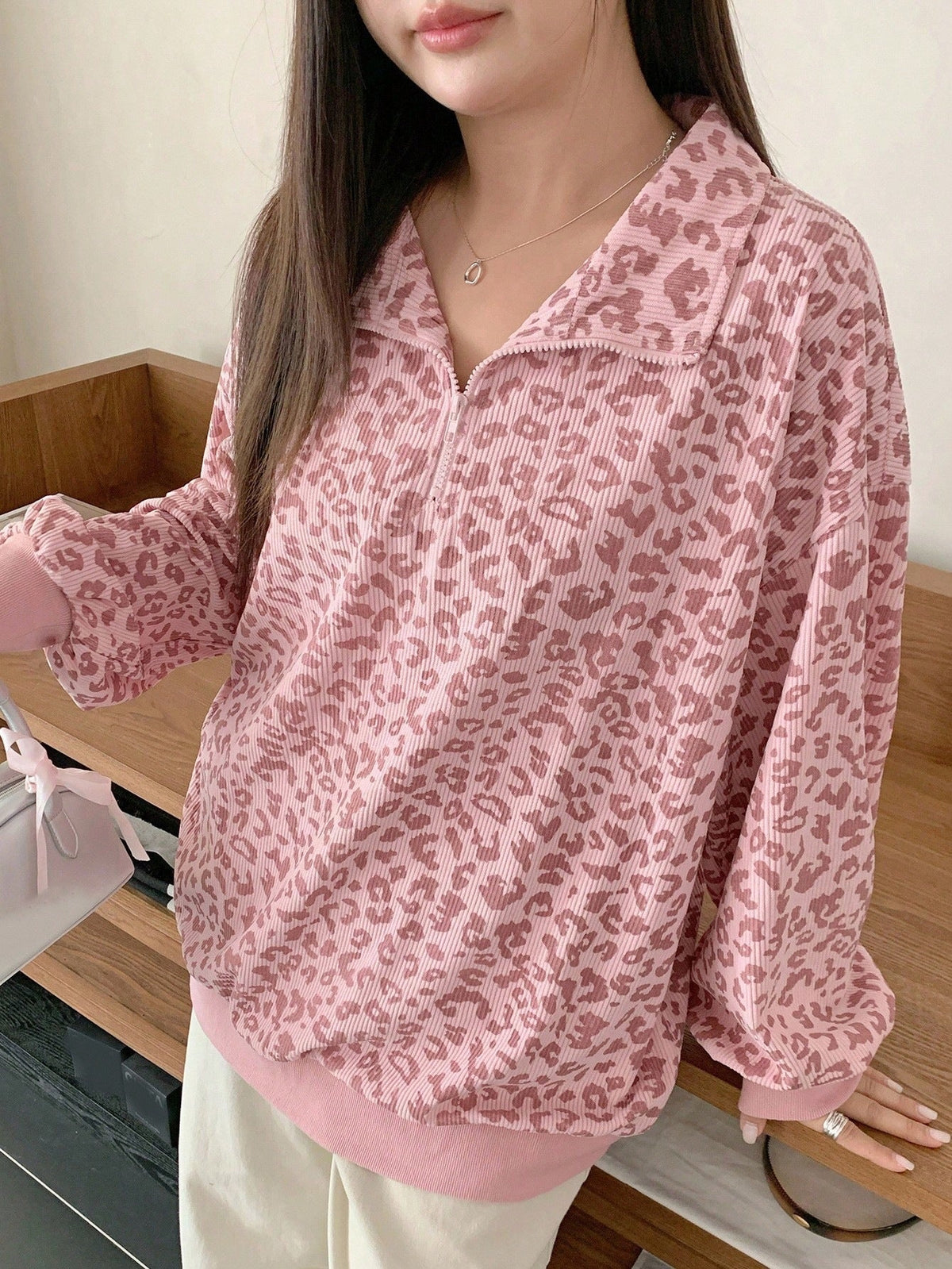 Women's casual corduroy hoodie with leopard print pattern, front view