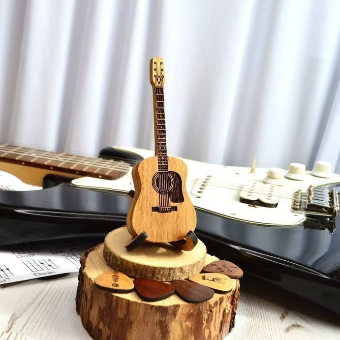 Wooden personalized guitar ornament with stand and guitar pick box gift during crafting process