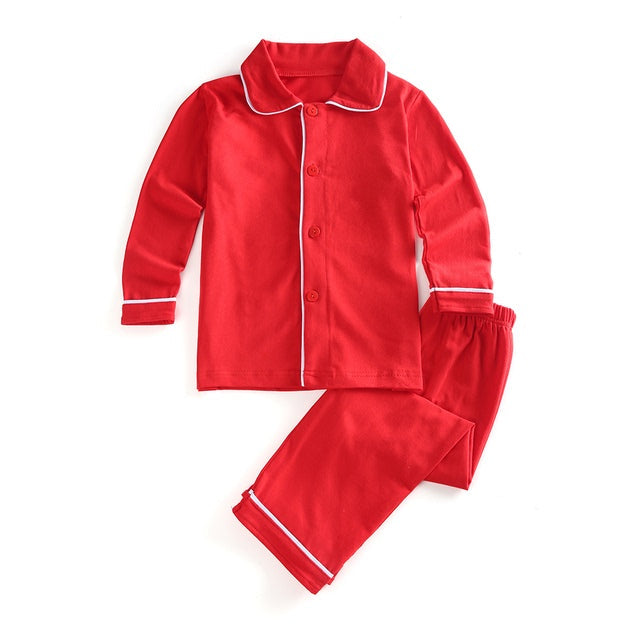 Red soft cotton children’s Christmas clothing with a solid color design and cute classic style