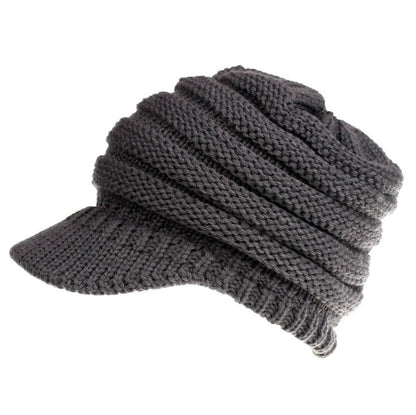 Women's ponytail beanie soft knitted winter hat in gray with a ponytail opening and warm skullcap design