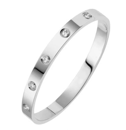 Women's fashion bracelet by BACKUPMYFILESNOW® featuring a stylish, intricate design in silver-tone metal, displayed on a neutral background.