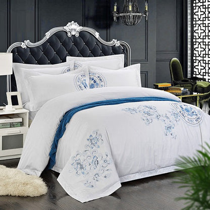 Four-piece cotton bedding set by My Store, shown neatly arranged in a soft neutral design