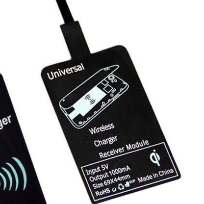 Wireless charger receiver shown on a plain background, compatible with smartphones