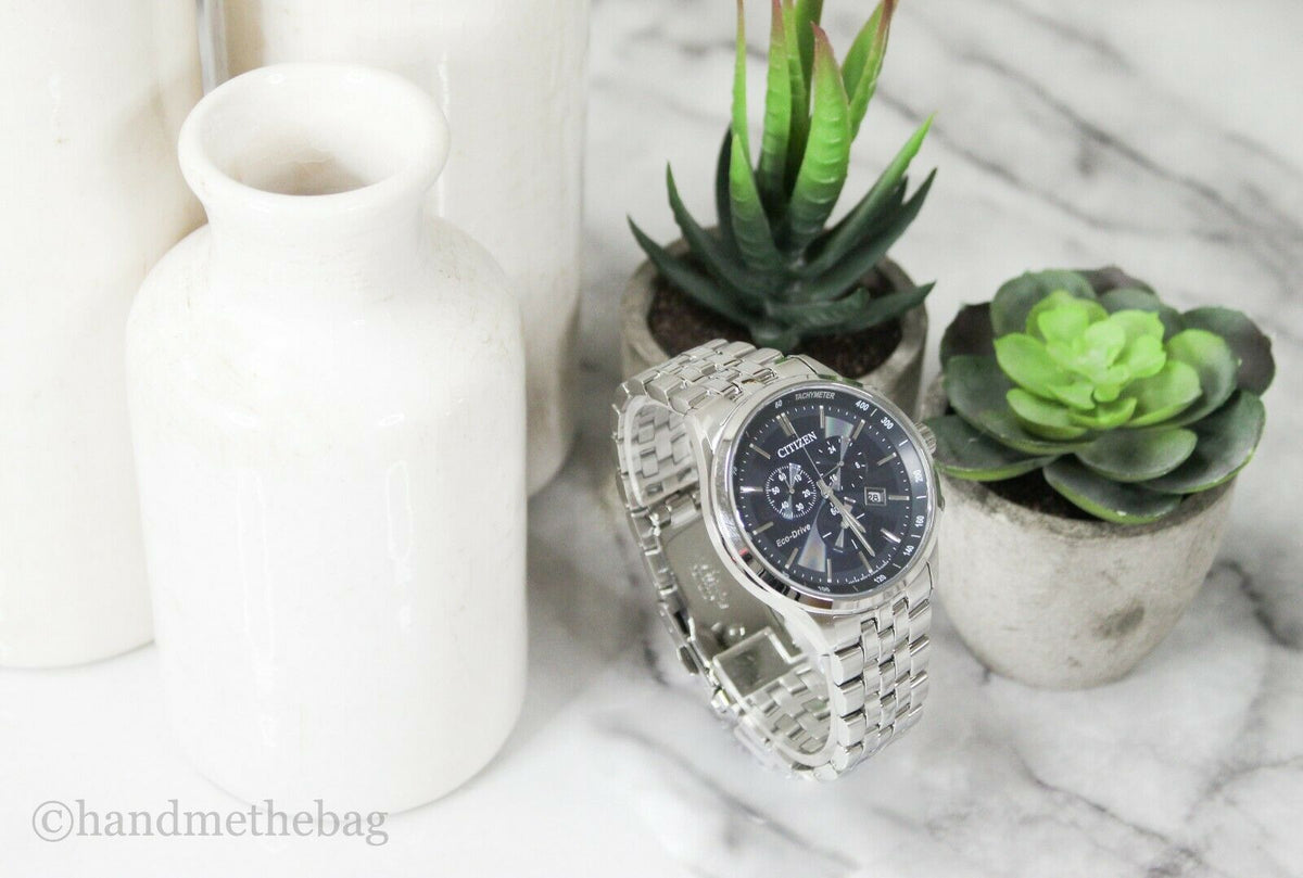 Citizen Sapphire Collection Eco-Drive chronograph watch with blue dial and stainless steel band, showcasing elegant timepiece design.
