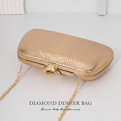 Women's stylish snake-print evening tote with sophisticated European-American design.