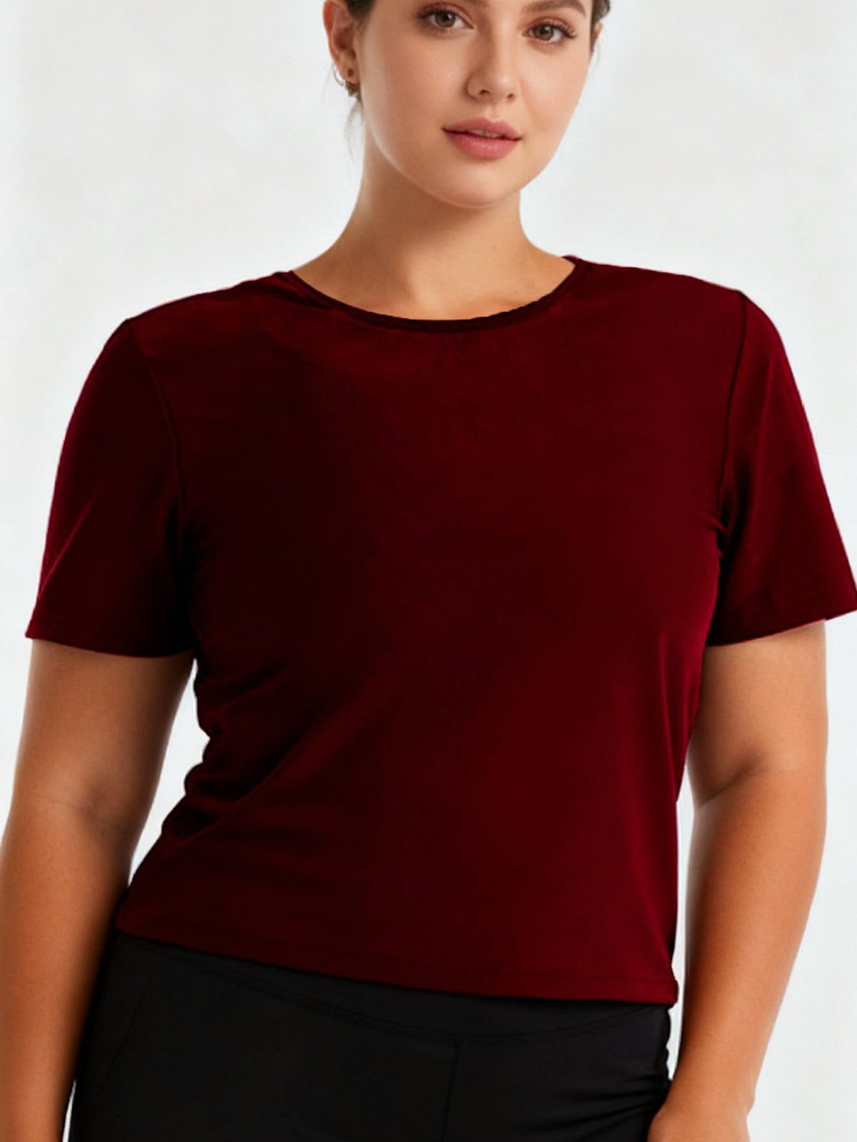 Women's short sleeve sauna shirt sweat suit compression tee with fitted athletic design