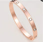 Women's fashion bracelet by BACKUPMYFILESNOW® featuring stylish design with metal and bead accents.