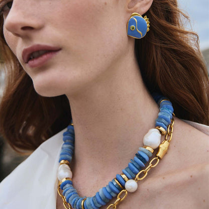 Retro chic blue little fish earrings with playful fish-shaped design