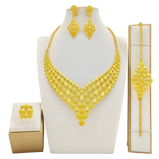 Women's fashion jewelry four-piece set with necklace, bracelet, ring, and earrings