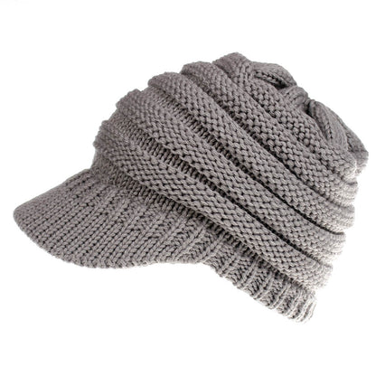 Women’s ponytail beanie, soft knitted autumn winter hat in warm black fabric with a back opening for hair乱子伦