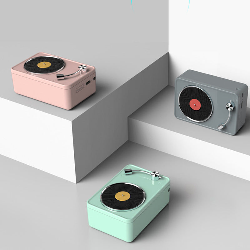 Retro vinyl record wireless speaker with classic record design and visible controls