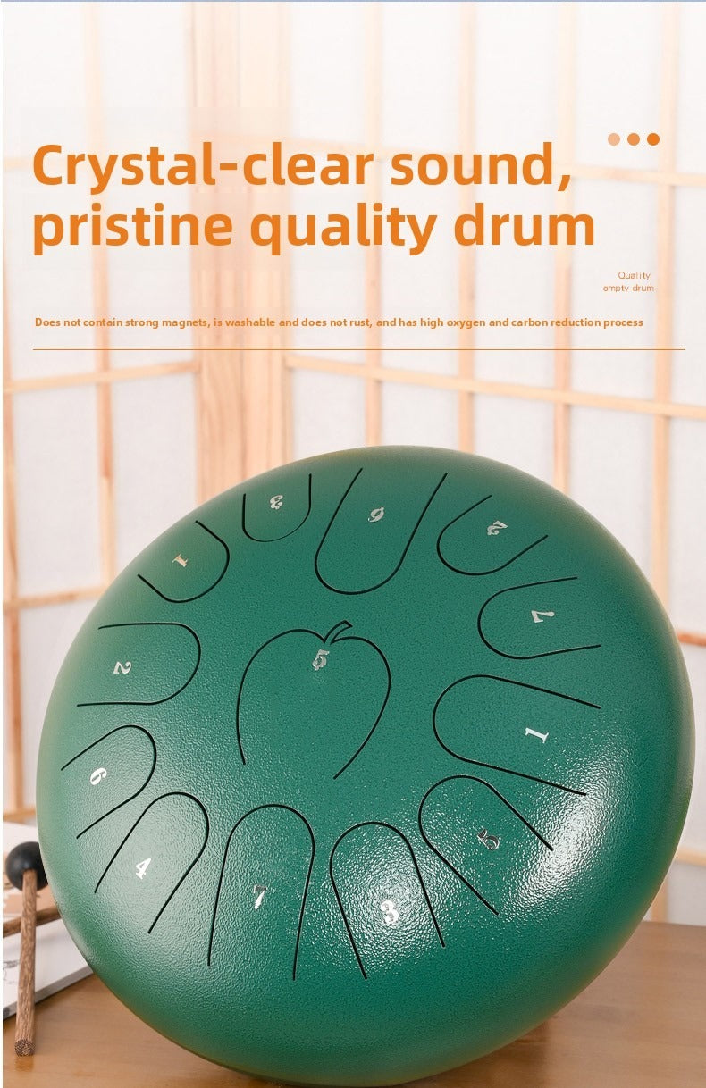 12-inch 13-note steel tongue drum in apple style, featuring a round metal design and tongue-shaped cutouts