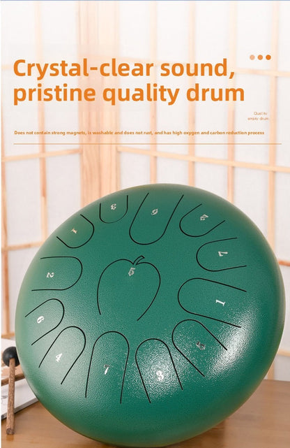 12-inch 13-note steel tongue drum in apple style, featuring a round metal design and tongue-shaped cutouts