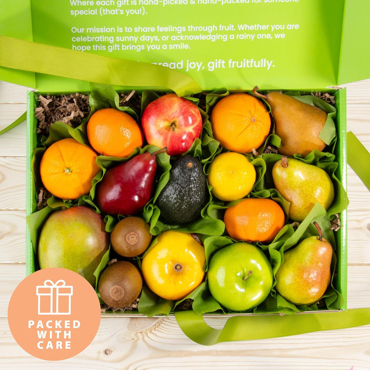 Fresh fruit gift basket by A Gift Inside featuring pears, apples, navel oranges, and tropical fruits arranged in a decorative basket.