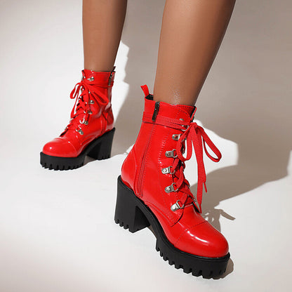 Patent leather chunky-heel riding boots with thick sole front detail