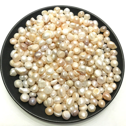 Natural pearl crushed stone granules in assorted irregular pieces, product close-up