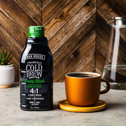 Java House Decaf Cold Brew 4:1 concentrate in a glass bottle with a black cap, ready for brewing or drinking.