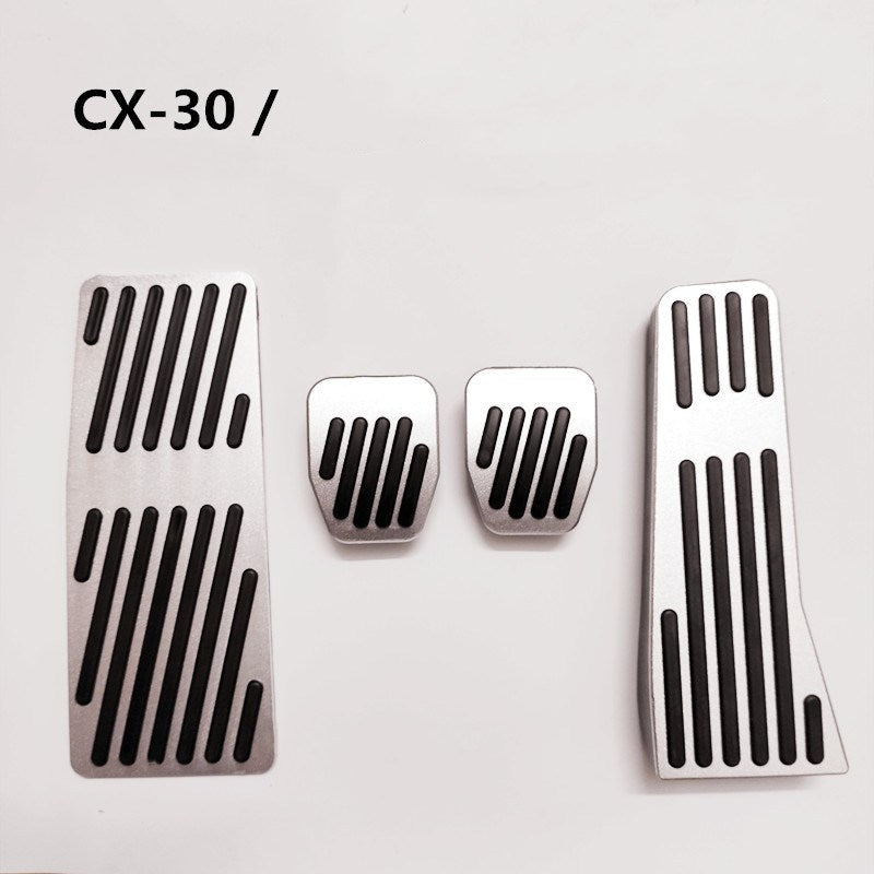 Metal throttle brake pedal cover, close-up view