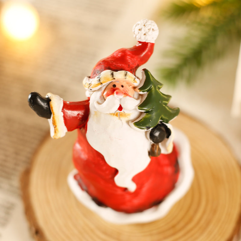 Desktop Christmas decorations and mini decorations arranged for a festive display
