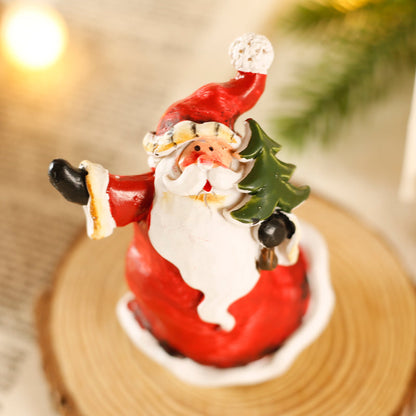 Desktop Christmas decorations and mini decorations arranged for a festive display