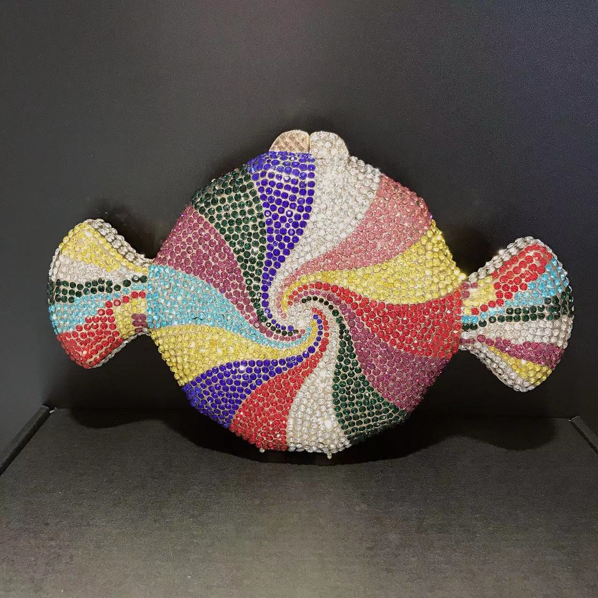 Women's diamond candy shape crystal clutch bag, featuring a sparkling faceted design and metallic frame