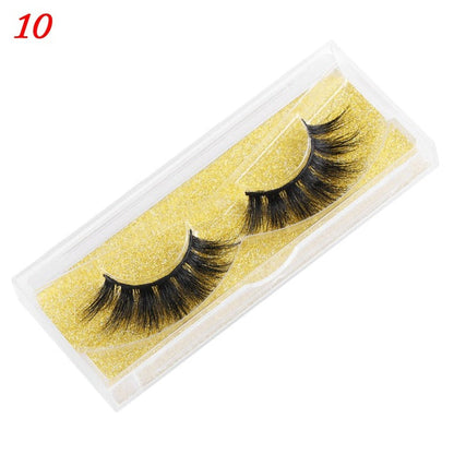 25mm wispy fluffy mink eyelashes, close-up of soft curled fake lashes in a compact tray