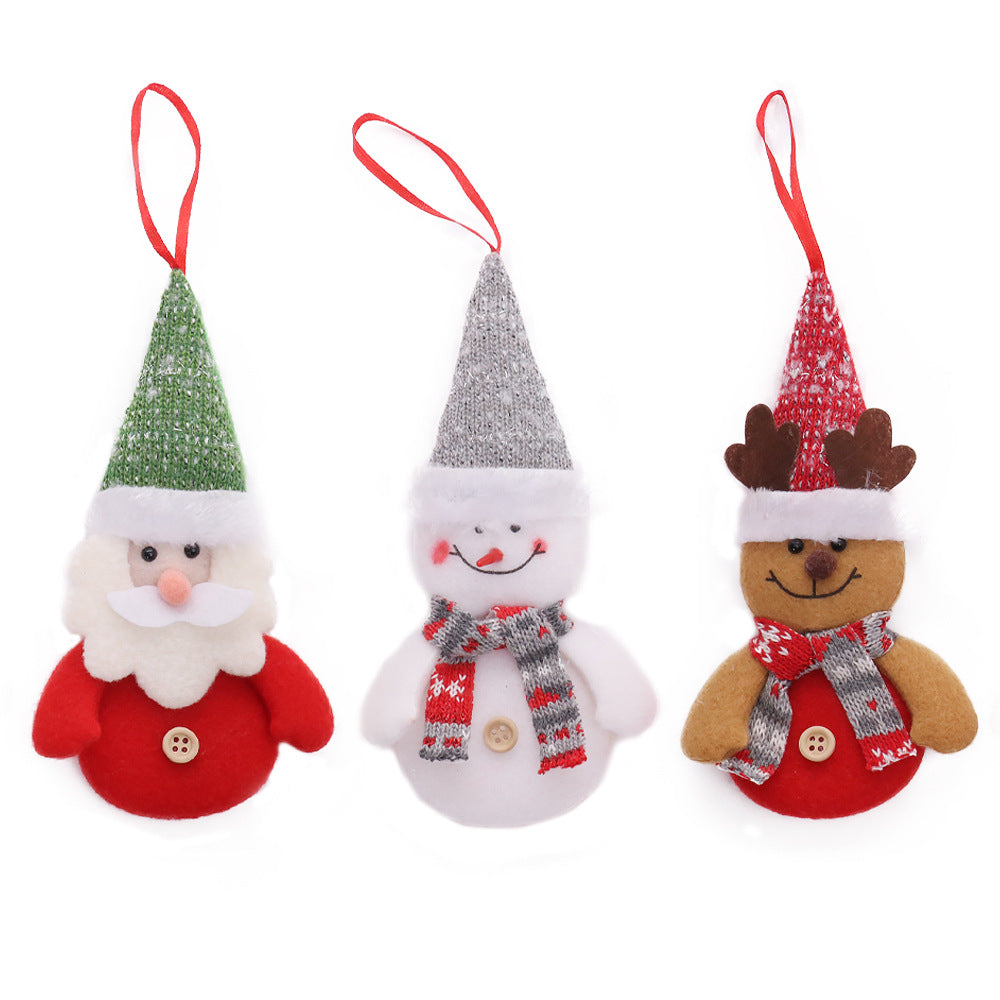 Christmas tree cartoon doll pendant in festive holiday colors hanging as a Christmas decoration