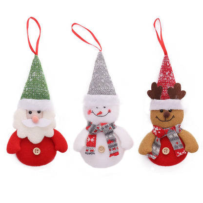 Christmas tree cartoon doll pendant in festive holiday colors hanging as a Christmas decoration