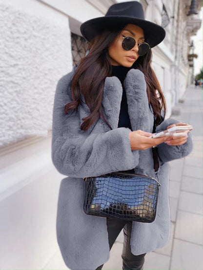 Women's long sleeve lapel faux fur coat in solid color, front view