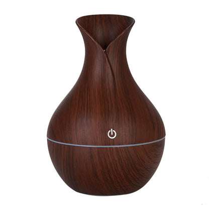 Vase humidifier with a decorative vase design in a compact tabletop form