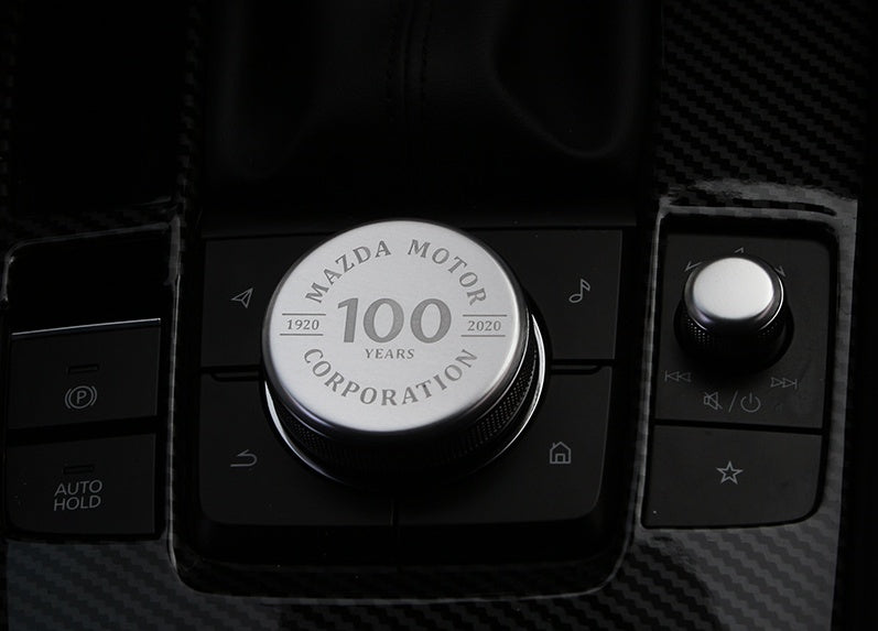 Central control knob sticker decal, close-up view