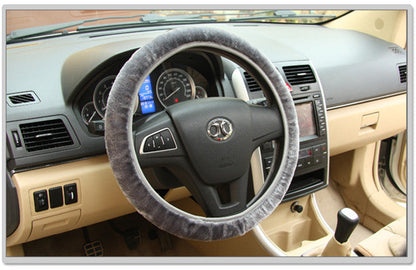 Steering wheel cover by My Store, black textured design fitted around a car steering wheel